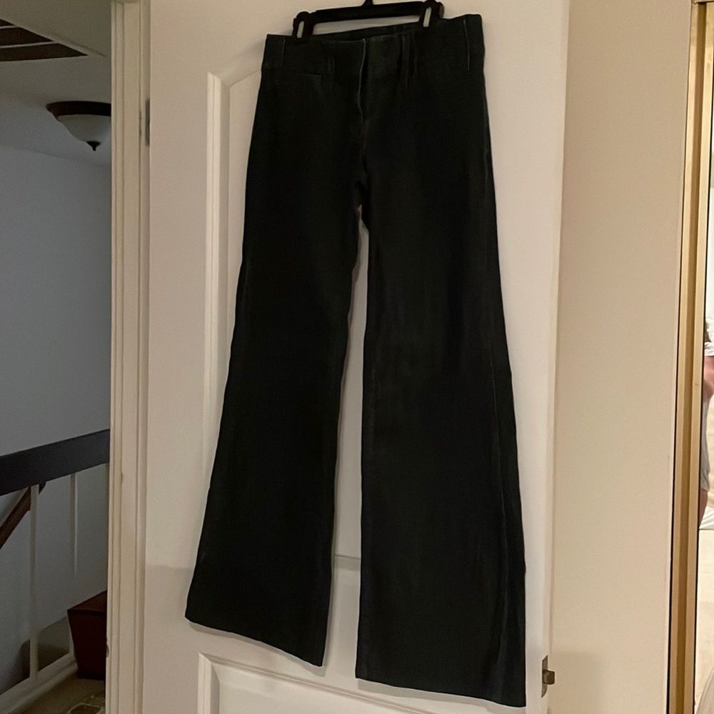 Macy’s INC brand high waisted bell bottom jeans. Cute with platform sandals.
